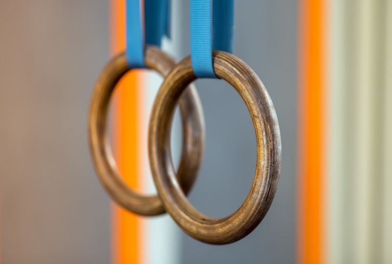 Gymnastic rings hanging in gym